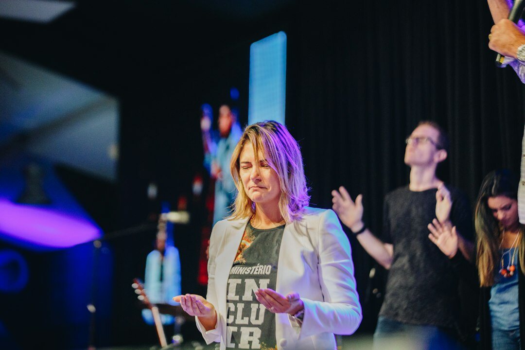 confident woman presenting to audience